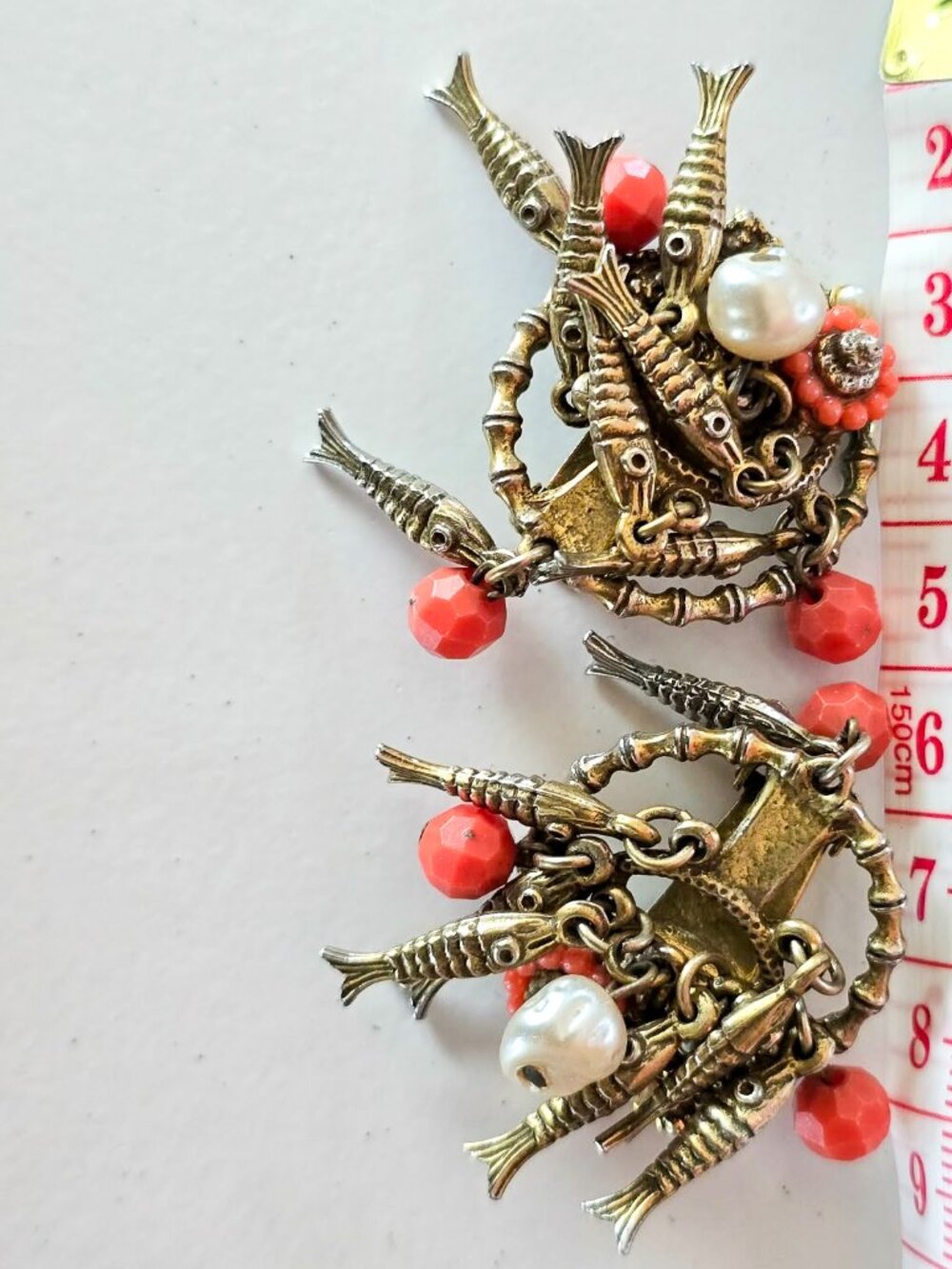 Clip on gold tone dangling fish on hoop earrings – vintage